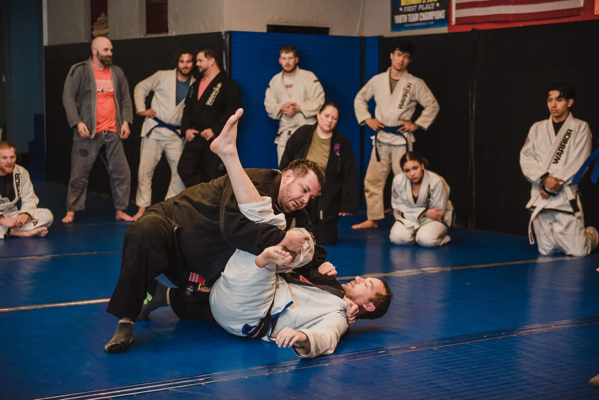 Adult BJJ students training at Warrior Brazilian Jiu-Jitsu Academy in Kennesaw GA