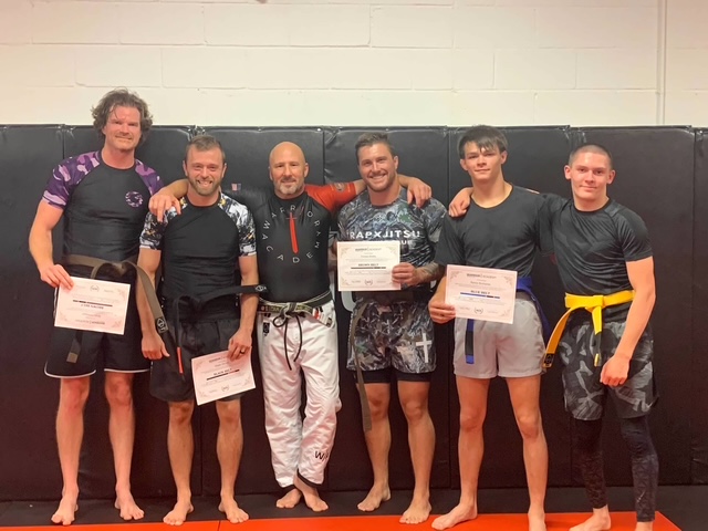 Warrior BJJ coaches and students training on the mat at Warrior Academy Kennesaw GA