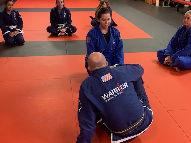 Women's BJJ class drilling technique at Warrior BJJ Academy