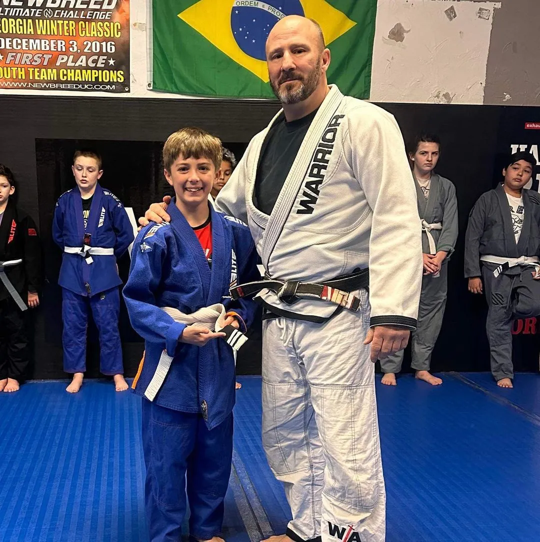 BJJ coach and students training at Warrior Academy Kennesaw